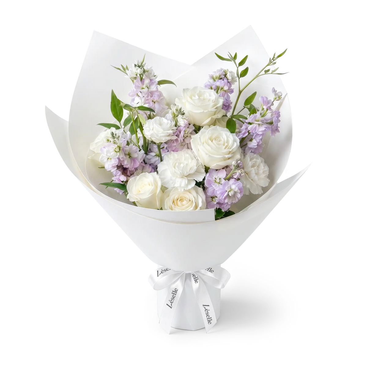 A fresh flower bouquet wrapped in white paper with a white ribbon, featuring white roses, white carnations, lavender stocks, and green foliage, set against a transparent background.